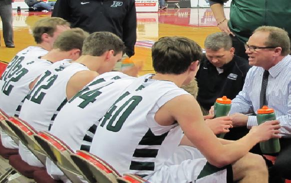 The conductor, Mark Core, new East High Basketball Coach, leading his team, the Pella Dutch, in the 2015 State Tournament. Core, who is taking over , and he is hoping to achieve a similar level of success; but not without some changes first. “We need to make sure we define success properly,” Core said. 