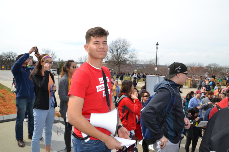 East High Schools President Alejandro Zarate leads the walk-out from East to the Capitol on April 20. Students were walking out in protest of the recent gun violence.